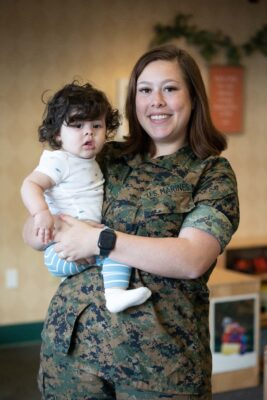 Military mom with her baby at ASYMCA Operation Little Learners