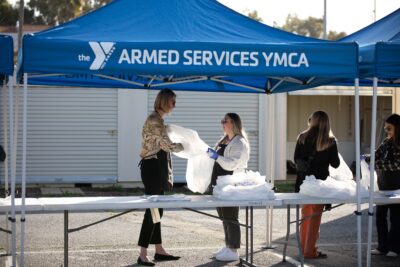ASYMCA volunteers at a food distribution event