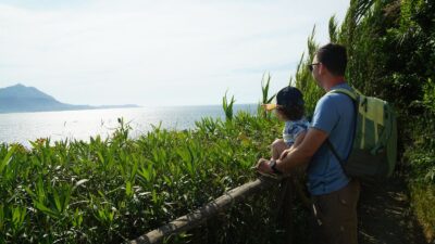 Military dad and son overlooking the beautiful views of Italy during a PCS move