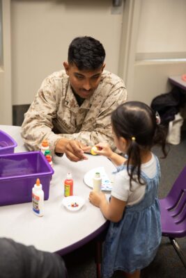 Military dad with his daughter at an ASYMCA Operation Little Learner's class