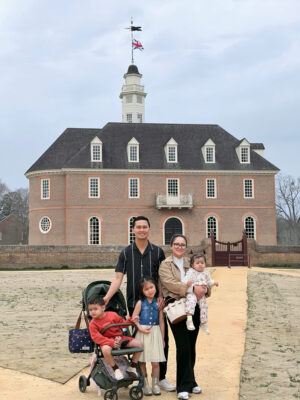 Young military family posing on a day out together.