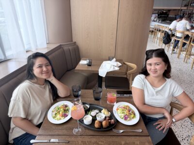 Military spouse and her friend enjoying lunch together.